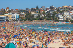 Overcrowded and unsustainable tourism development in Australia. Image Credit: danefromspain by iStock